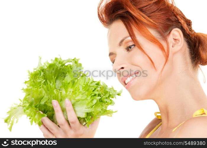 picture of happy woman with lettuce over white