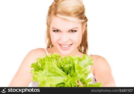 picture of happy woman with lettuce over white