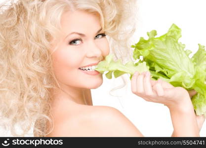 picture of happy woman with lettuce over white