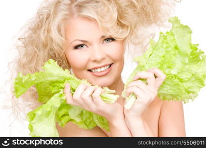 picture of happy woman with lettuce over white