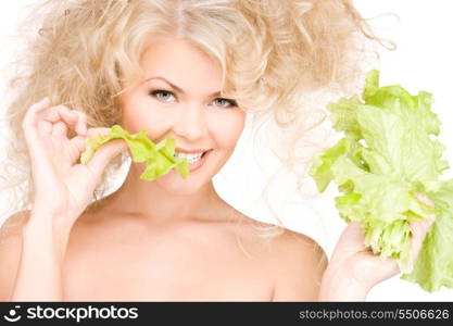 picture of happy woman with lettuce over white