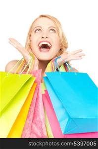 picture of happy woman with shopping bags