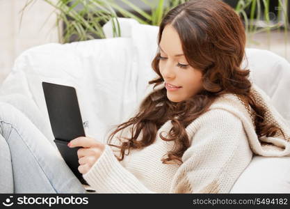 picture of happy woman with small notepad