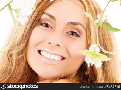 picture of happy woman with white flowers