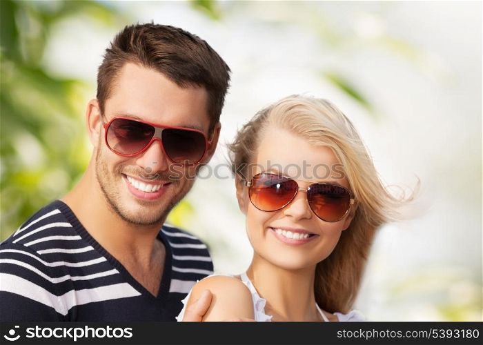 picture of happy young couple in the woods