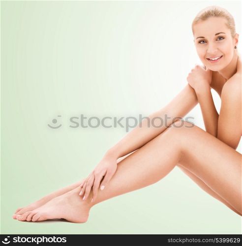 picture of healthy naked woman over green background
