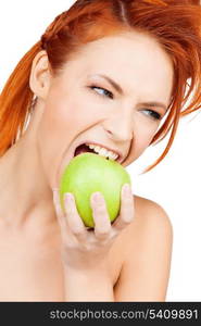 picture of healthy woman biting green apple