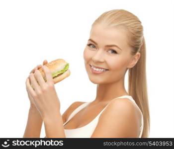 picture of healthy woman eating junk food