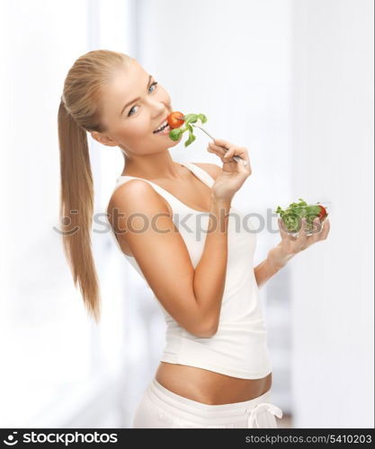 picture of healthy woman holding bowl with salad