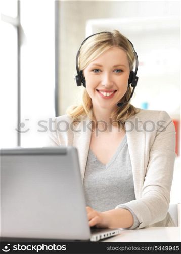 picture of helpline operator with laptop computer.