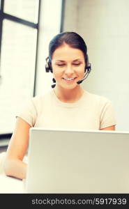 picture of helpline operator with laptop computer. helpline operator with laptop computer