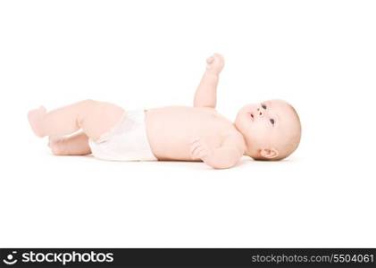 picture of laying baby boy in diaper over white