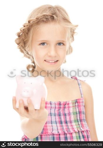 picture of little girl with piggy bank&#xA;