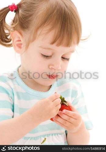 picture of little girl with strawberry over white
