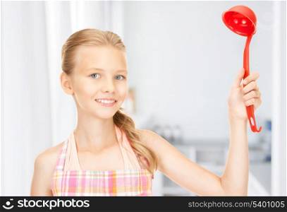 picture of little housewife with red ladle at kitchen