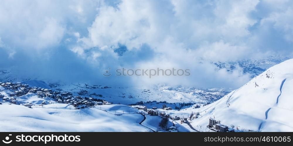 Picture of little village in snowy mountains, beautiful nature landscape, house covered with snow in Faraya mountain location, winter resort, frosty weather, outdoor panorama, holiday greeting card