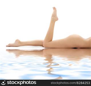 picture of long legs of relaxed lady in water
