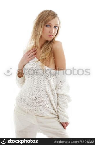 picture of lovely blond in white linen trousers and sweater