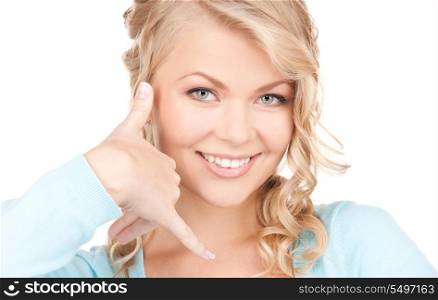 picture of lovely blonde making a call me gesture
