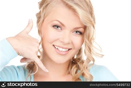 picture of lovely blonde making a call me gesture