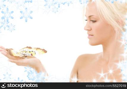 picture of lovely blonde with butterfly and snowflakes