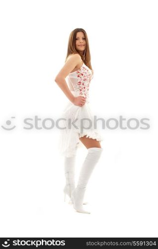 picture of lovely brunette in high boots over white