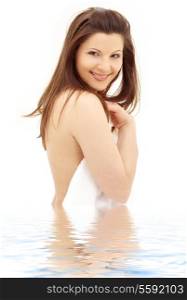picture of lovely brunette with white towel in water