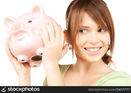 picture of lovely girl with big piggy bank