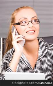 picture of lovely girl with cell phone in office