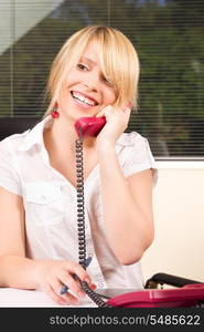 picture of lovely girl with phone in office