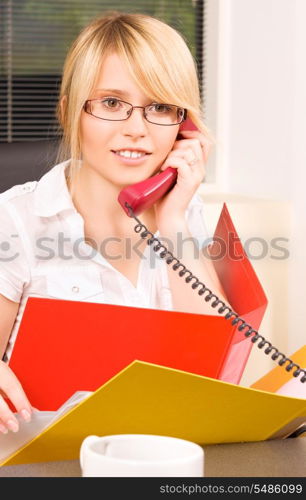 picture of lovely girl with phone in office