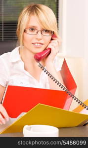 picture of lovely girl with phone in office