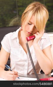 picture of lovely girl with phone in office