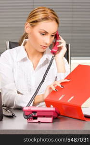 picture of lovely girl with phone in office