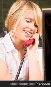 picture of lovely girl with phone in office