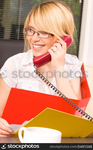 picture of lovely girl with phone in office