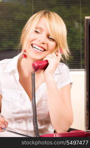 picture of lovely girl with phone in office