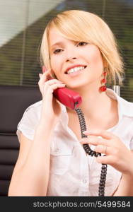 picture of lovely girl with phone in office