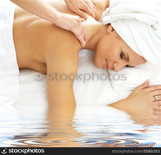 picture of lovely lady relaxing in massage salon