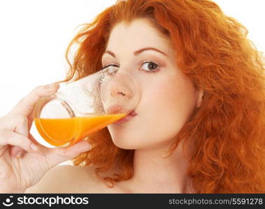 picture of lovely redhead drinking orange juice
