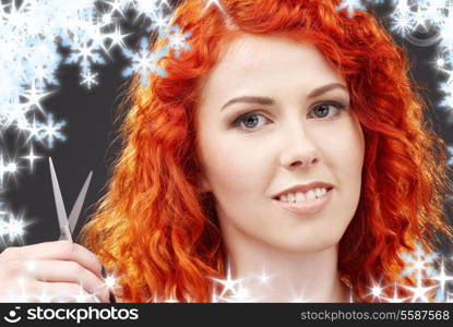 picture of lovely redhead with scissors and snowflakes