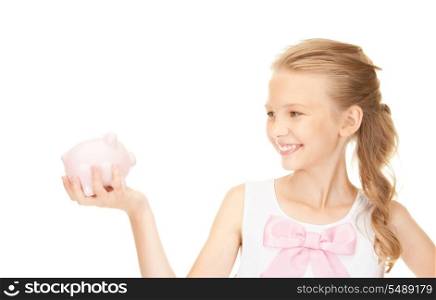picture of lovely teenage girl with piggy bank