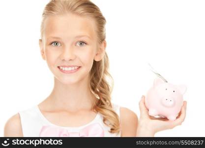 picture of lovely teenage girl with piggy bank and money
