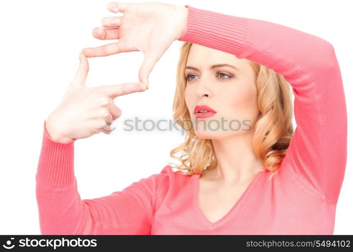 picture of lovely woman creating a frame with fingers