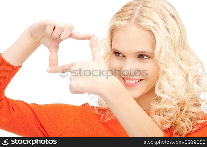 picture of lovely woman creating a frame with fingers