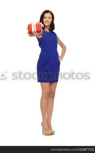 picture of lovely woman in blue dress with present