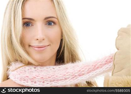 picture of lovely woman in comforter and mittens over white