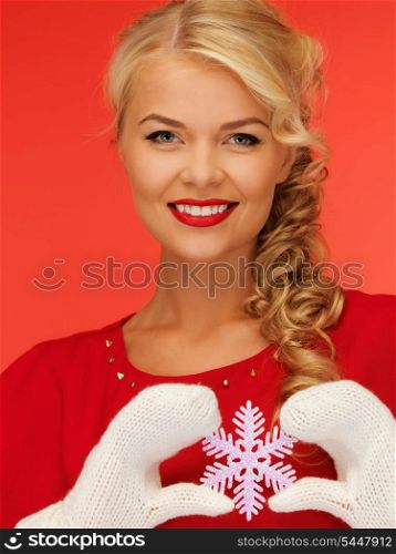 picture of lovely woman in mittens and red dress with snowflake