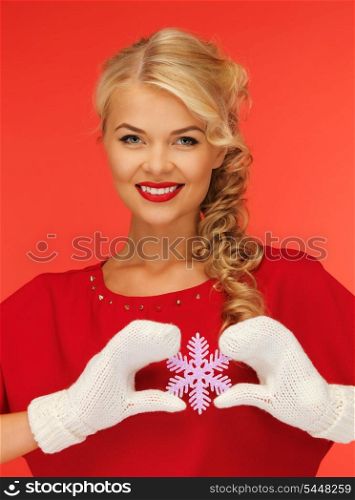 picture of lovely woman in mittens and red dress with snowflake