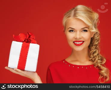 picture of lovely woman in red dress with present